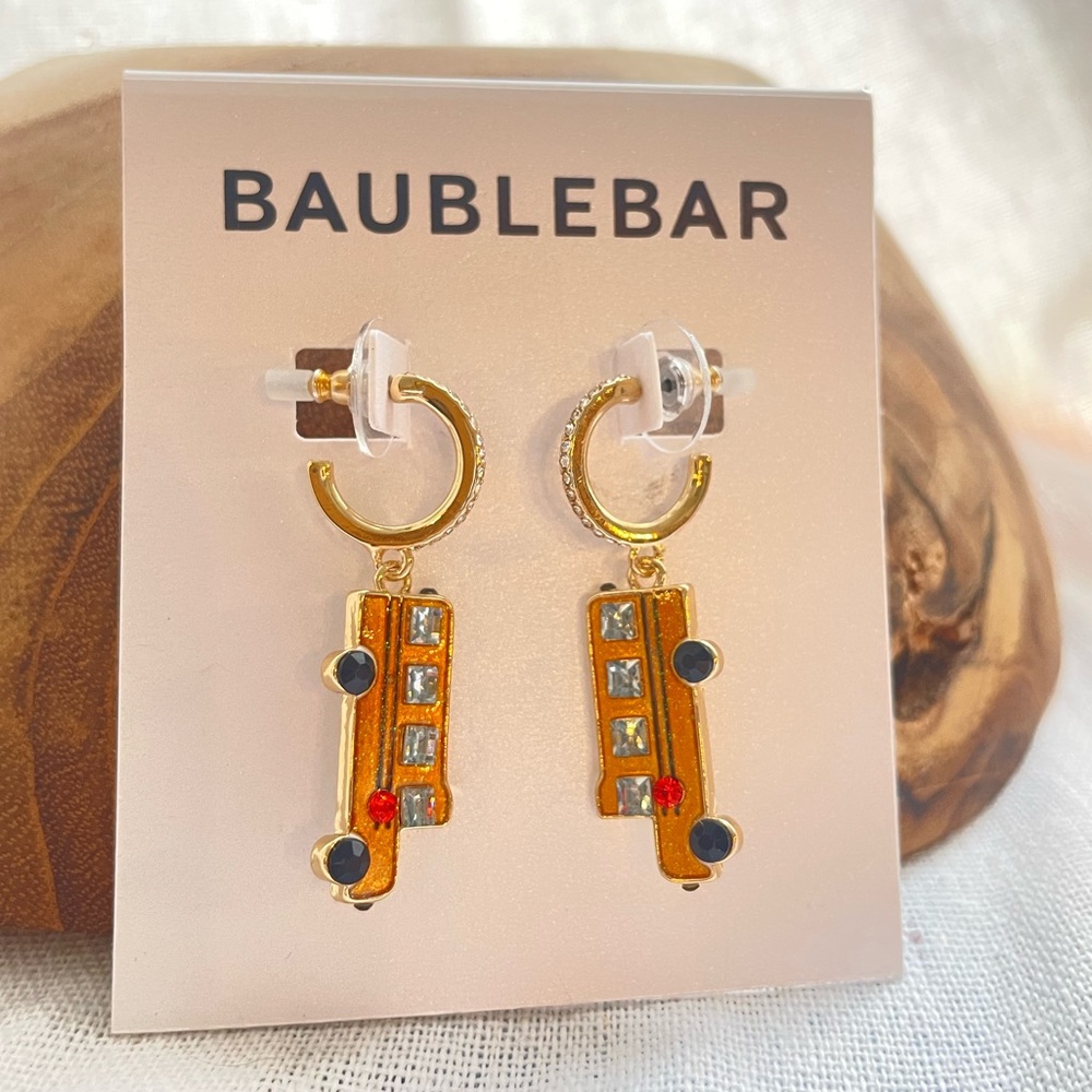 BAUBLEBAR school bus dangles on studded hoops with studs to accent bus details.